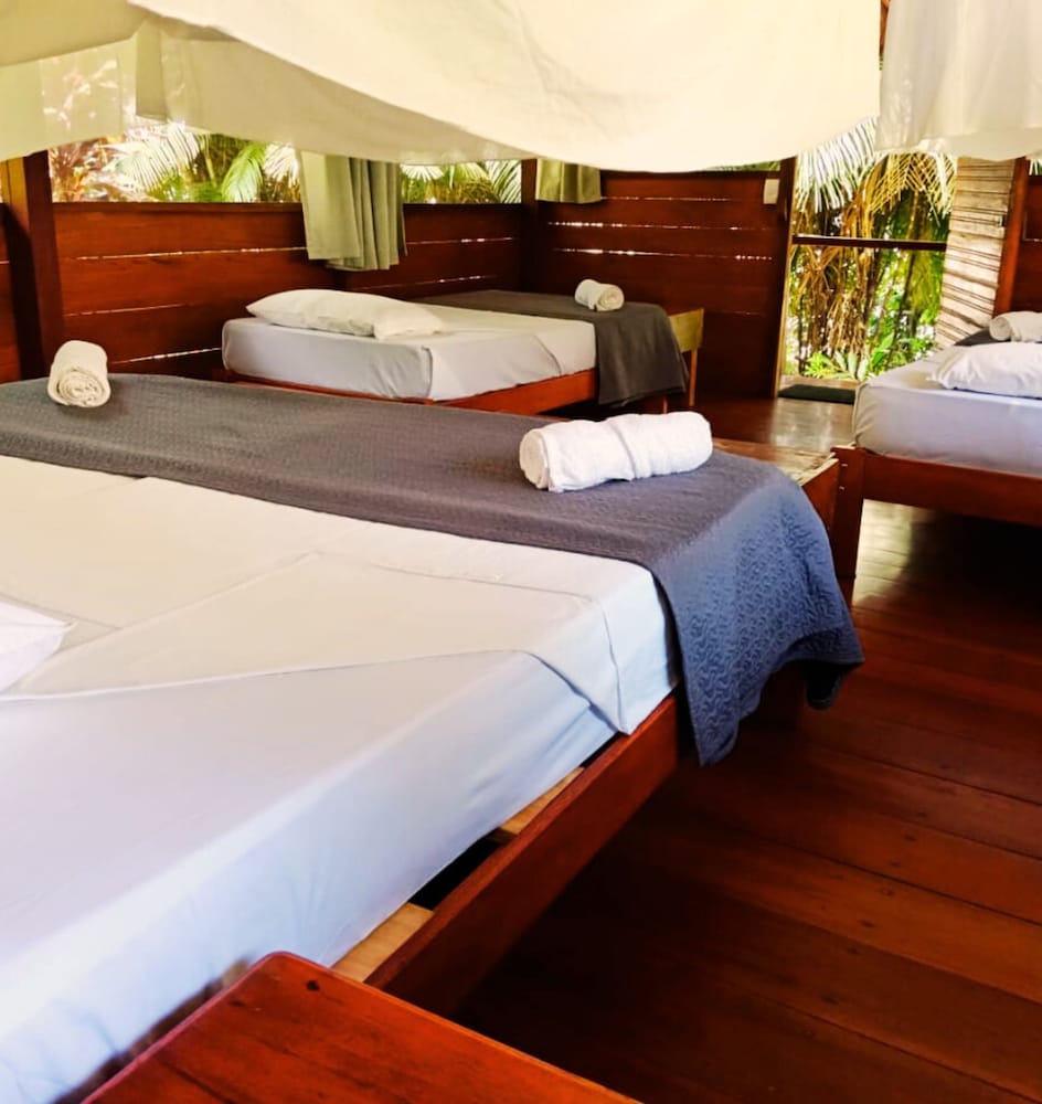 Standard Triple Room, Garden View, Beachside photo 1