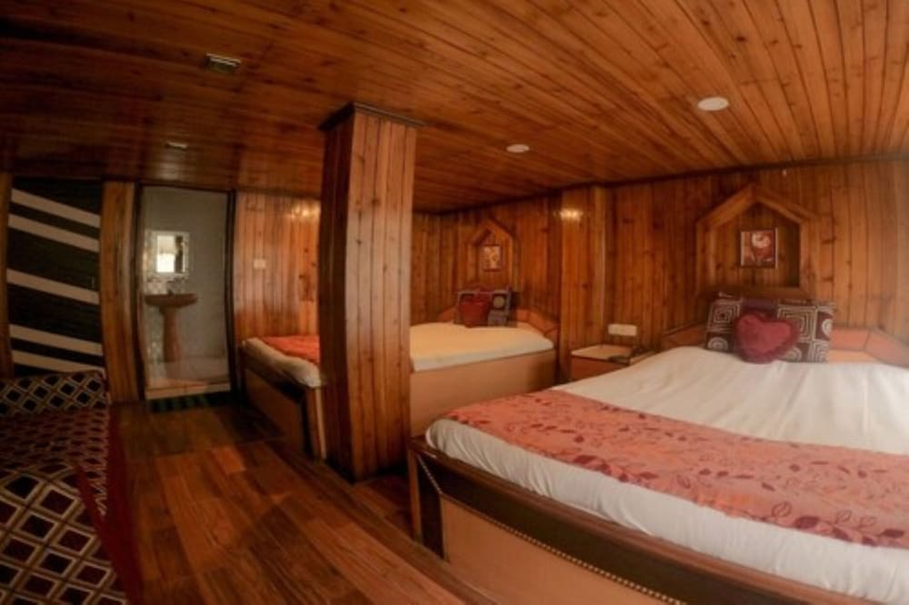 Deluxe Quadruple Room - Photo 7