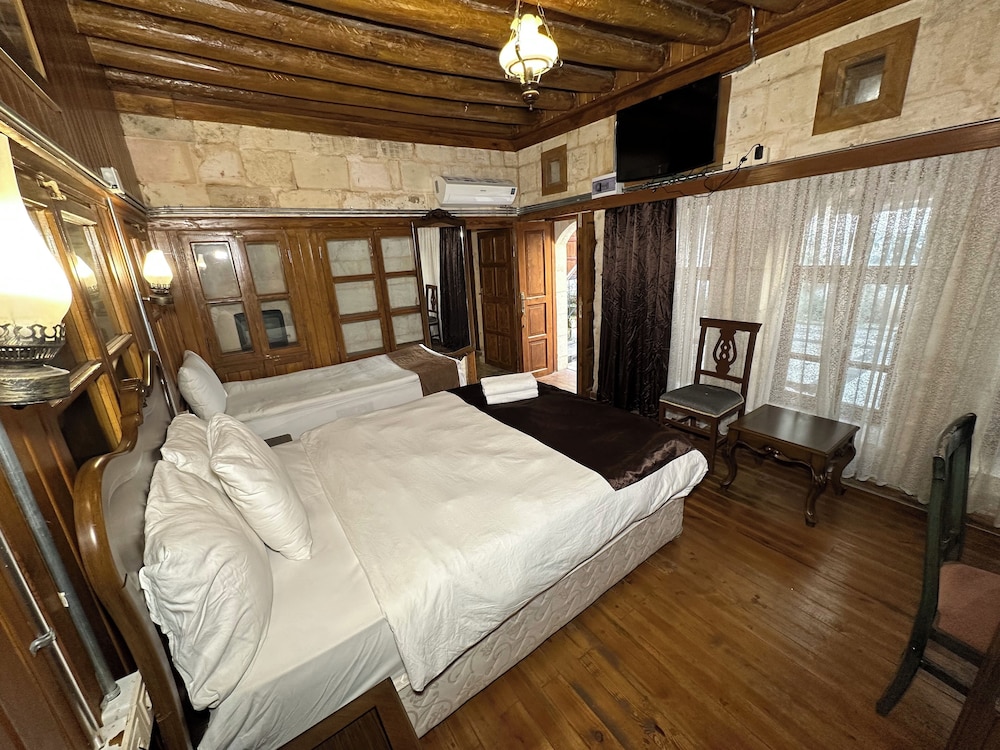 Standard Triple Room, Courtyard View photo 1