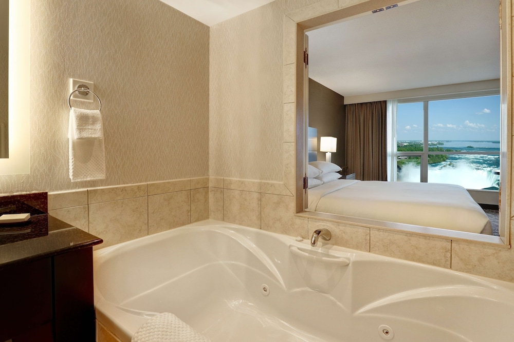 King Bed with Whirlpool, Sofa Bed and partial view of Niagara Falls - Floor 30 thumbnail 6