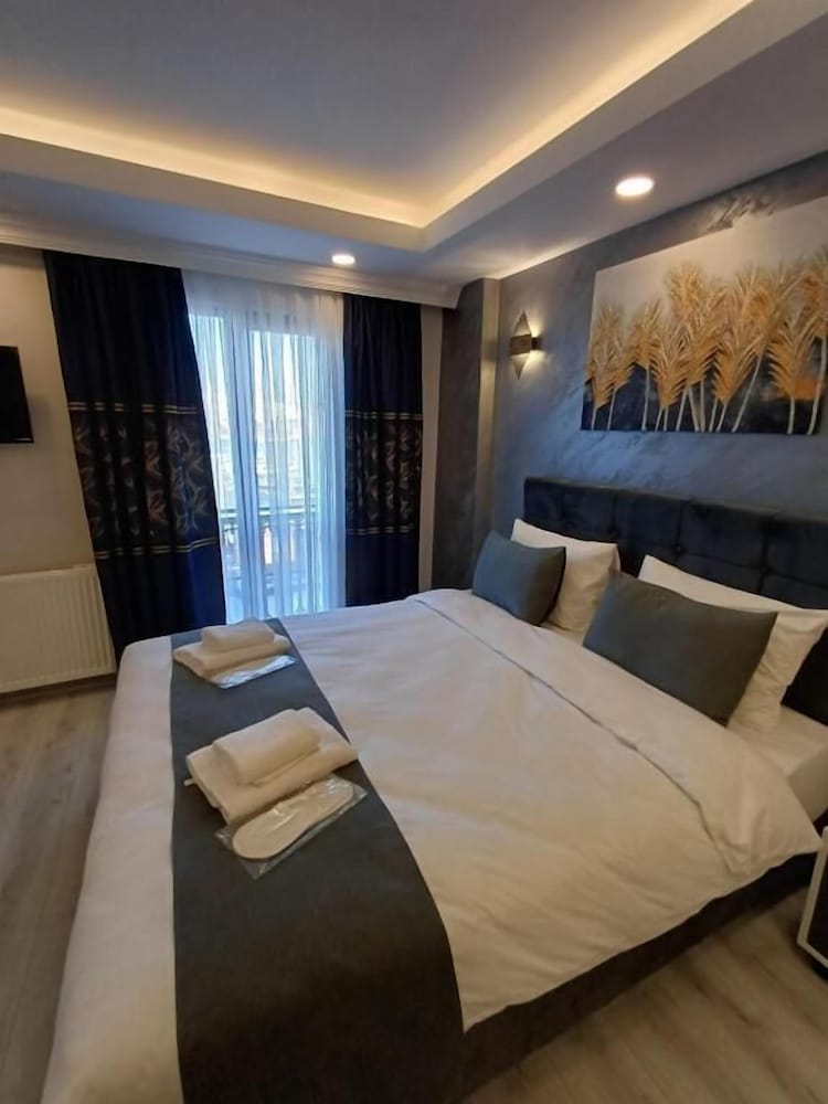 Deluxe Quadruple Room, Sea View photo 3