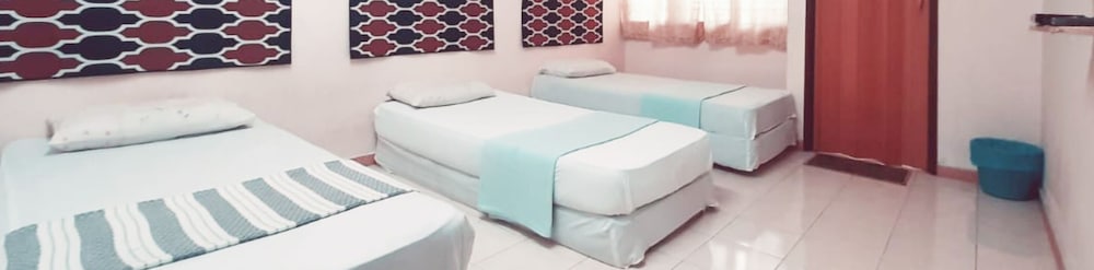 Homestay Triple Single Room photo 1
