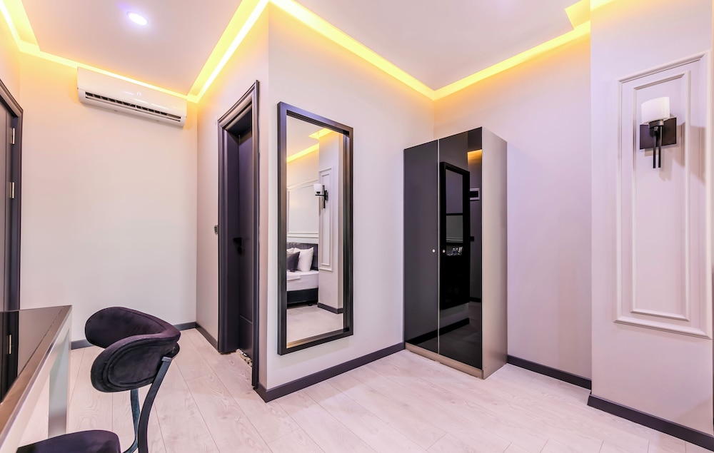 Deluxe Quadruple Room - Photo 11