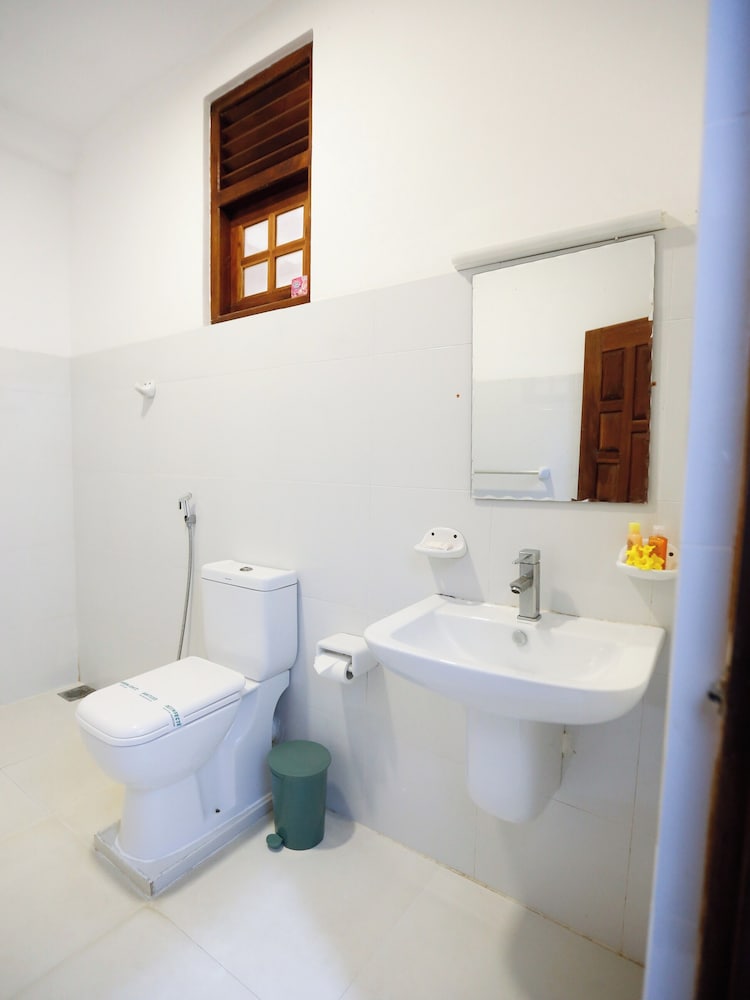 Deluxe Triple Room, Garden View photo 2