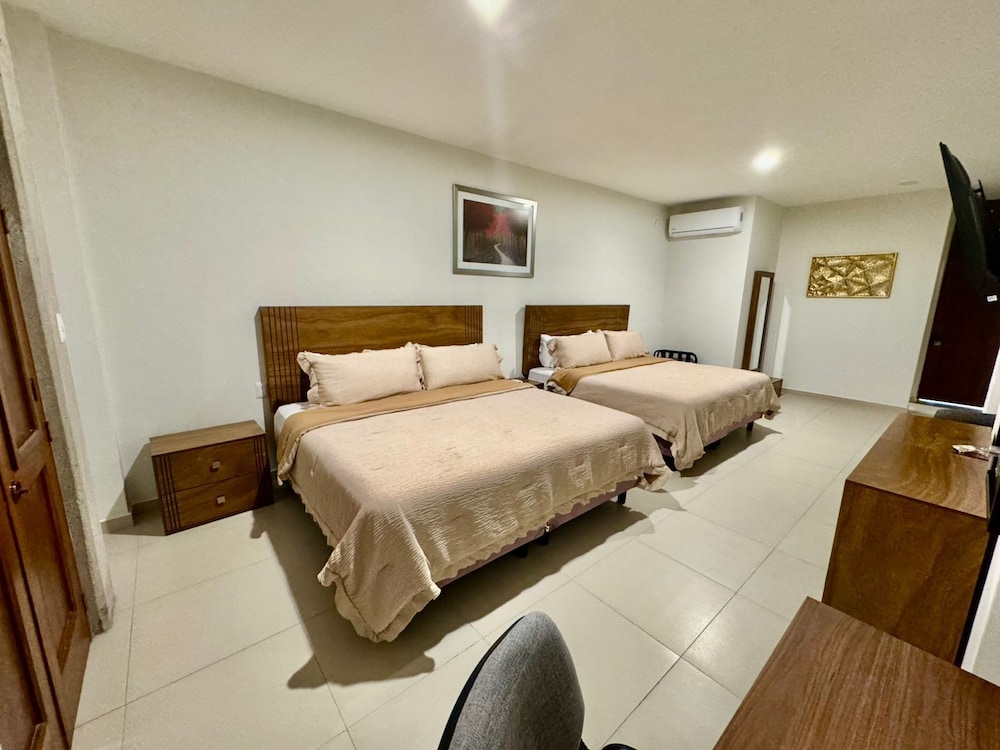 Deluxe Quadruple Room, Balcony, City View photo 3