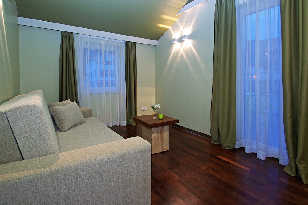 Deluxe Family Room with Balcony and Pool View
