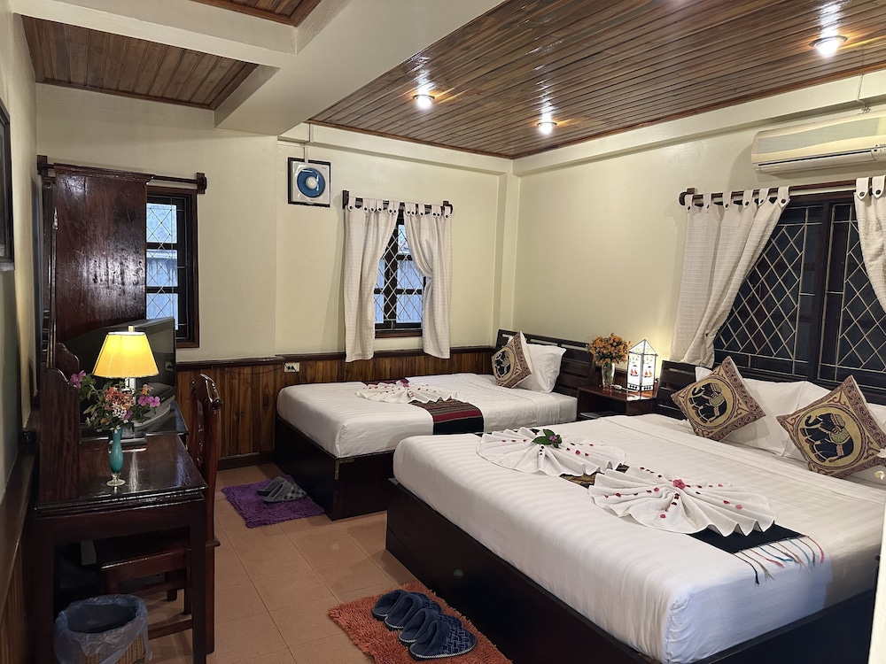 Deluxe Triple Room - Photo 16