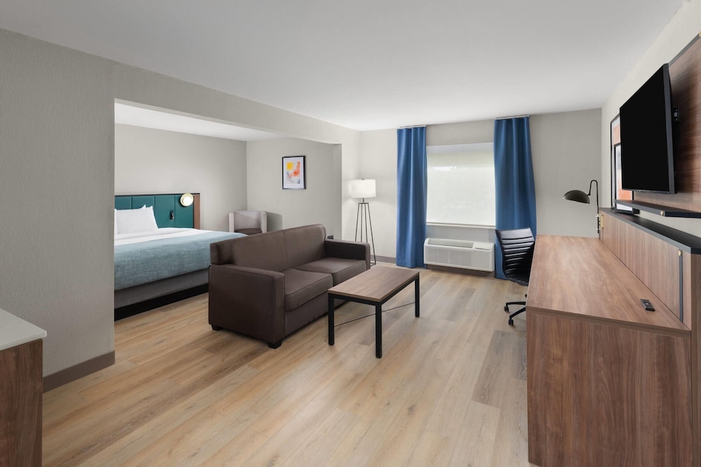 Suite, 1 King Bed with Sofa bed, Non Smoking - Photo 1