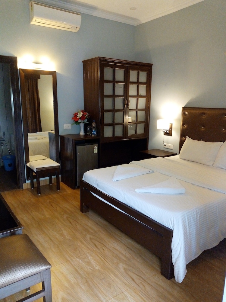 Deluxe Quadruple Room, 1 Bedroom, Balcony, Garden View photo 1