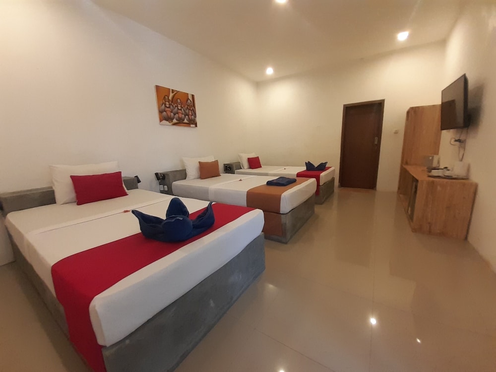 Deluxe Triple Room - Photo 11