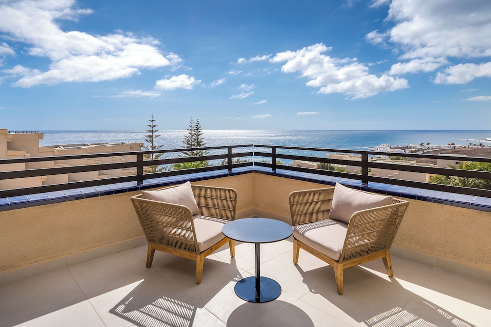 Suite Júnior, Vista al Mar (Deluxe - 2 Adultos 1 Niño)