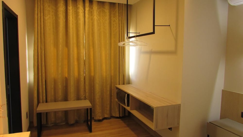 Triple Room (3 Camas de Solteiro)