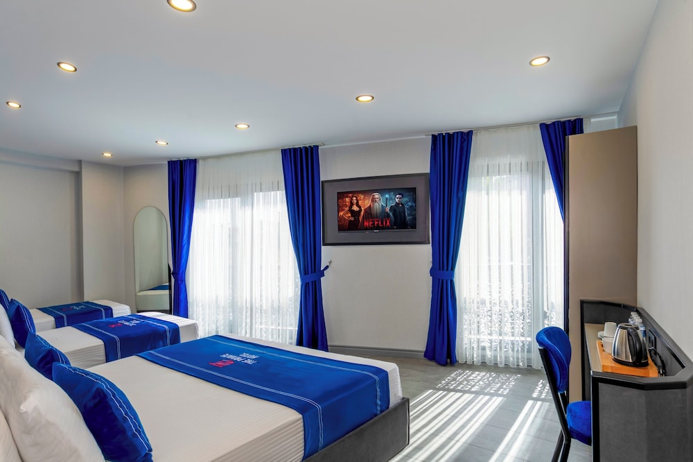 Deluxe Quadruple Room - Photo 4