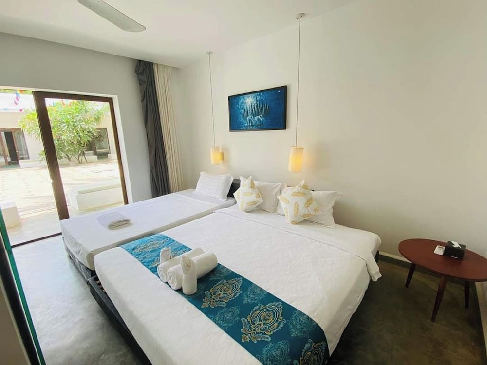 Deluxe Triple Room