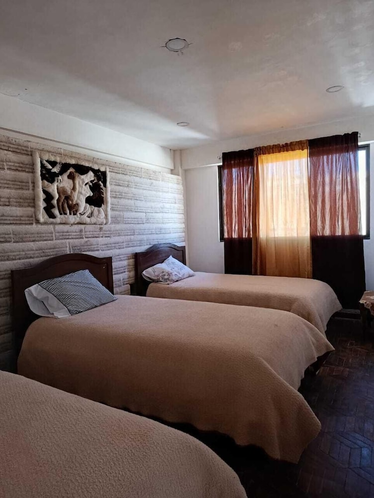 Basic Triple Room, Multiple Beds, Courtyard View photo 1