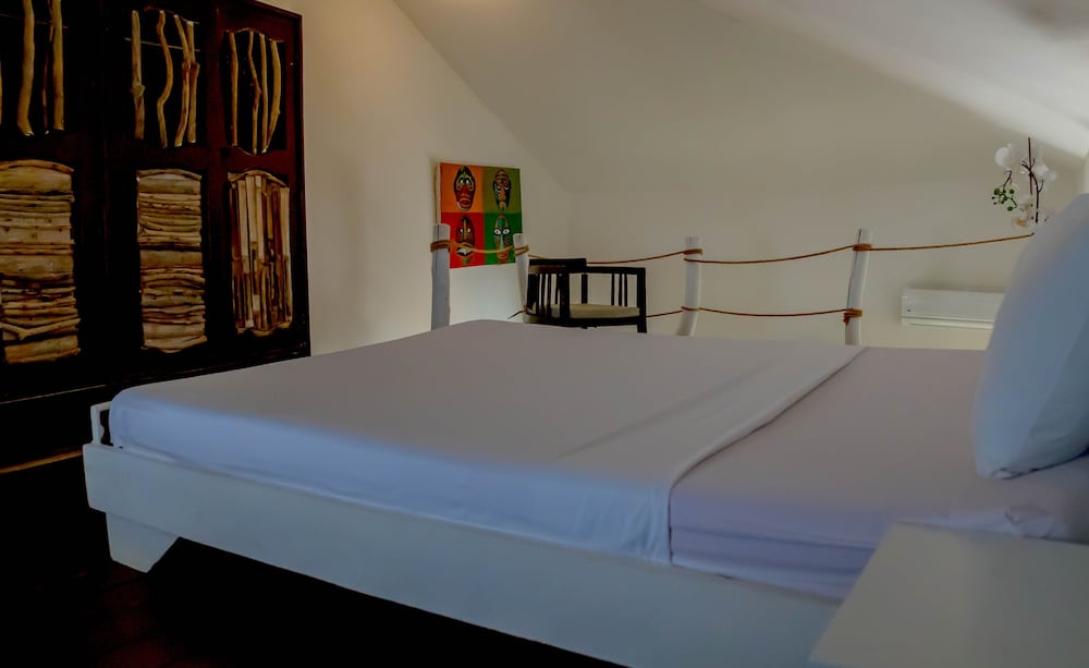 Deluxe Quadruple Room, Garden View, Garden Area photo 2