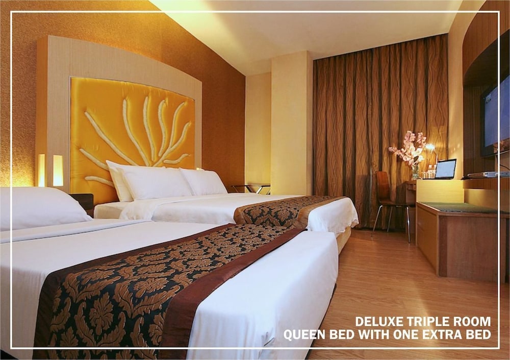 Deluxe Triple Room - Photo 1