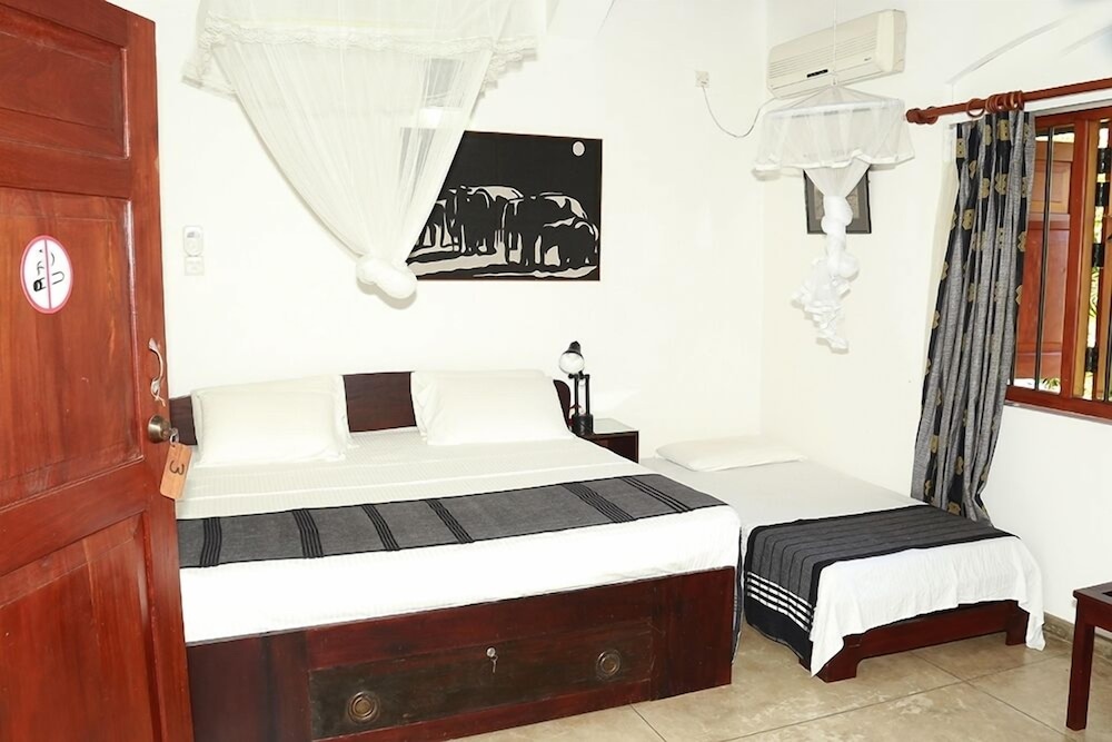 Deluxe Triple Room, Pool Access, Lake View photo 1