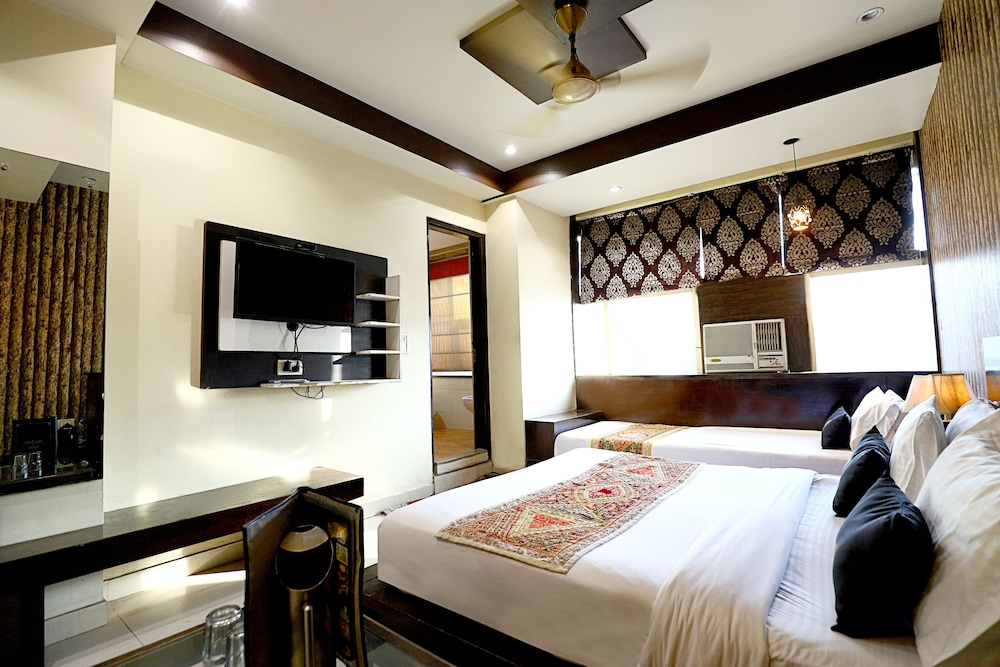 Deluxe Triple Room - Photo 8