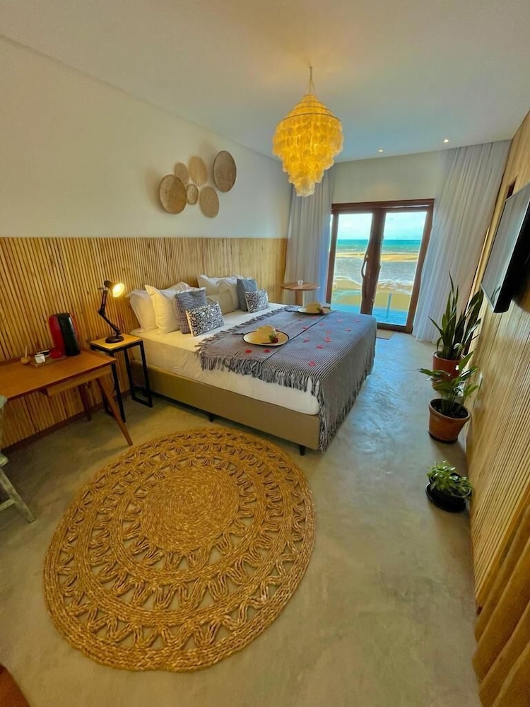 Quarto com Cama King-size e Vista do Mar