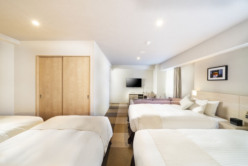 Quadruple Room (Single Use) - Photo 1