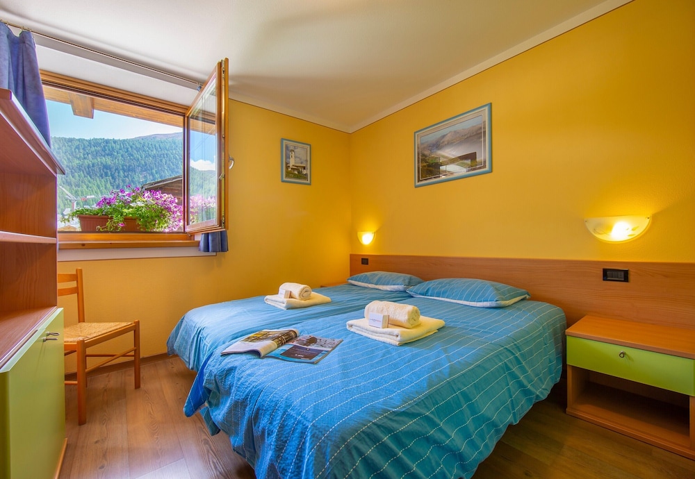 Family Apartment, Multiple Bedrooms (Italia 1 Ski in- Ski out 50m)