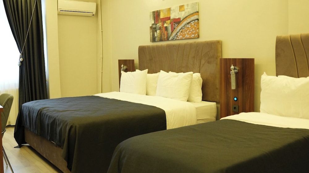 Family Quadruple Room - Photo 7