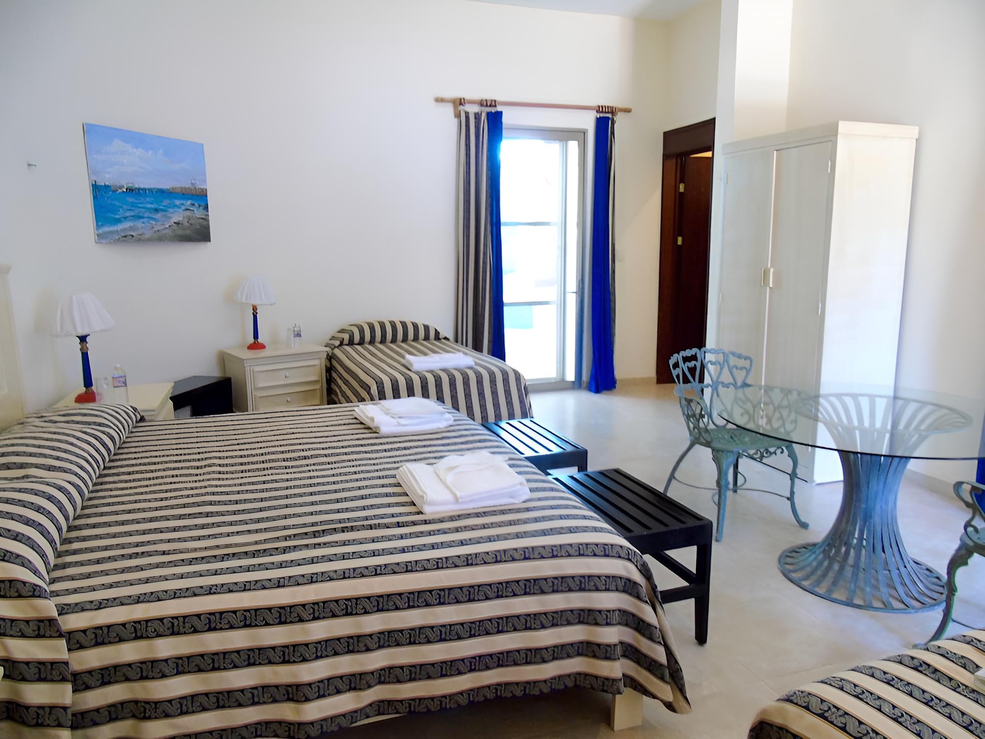 Standard Quadruple Room, Garden View photo 2
