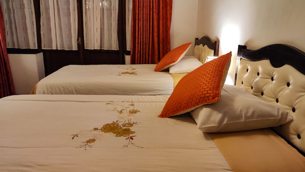 Deluxe Triple Room, Patio, Garden View