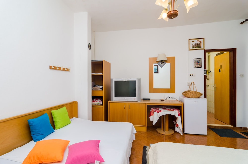 Triple Room (Triple Room with Patio and Sea View)