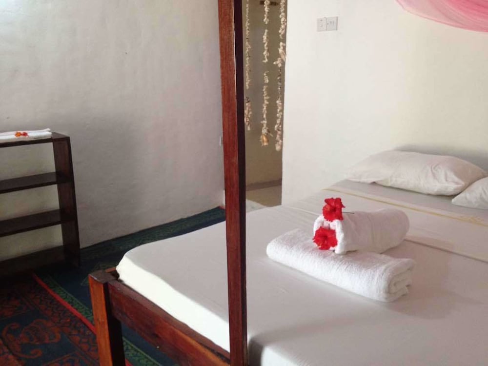 Deluxe Double Room, Multiple Beds, Partial Ocean View, Garden Area