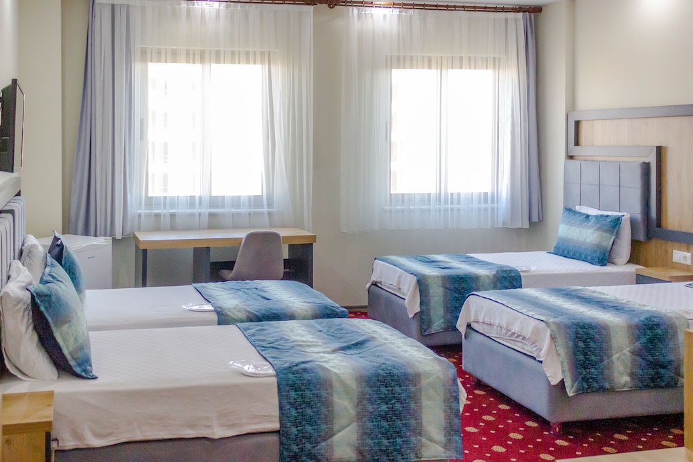 Quadruple Room - Photo 1
