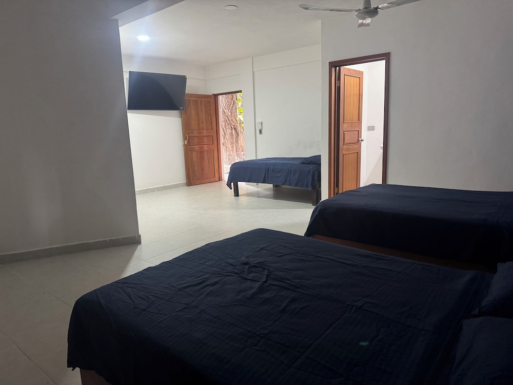 Deluxe Triple Room, Multiple Beds, Private Bathroom, Pool View