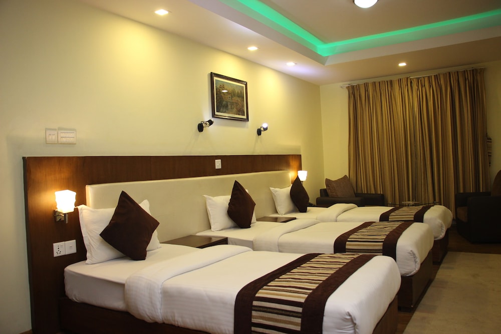 Deluxe Triple Room - Photo 1