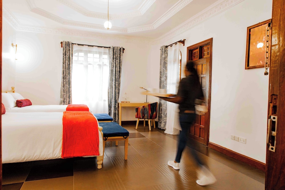 Deluxe Triple Room, Balcony, Courtyard View
