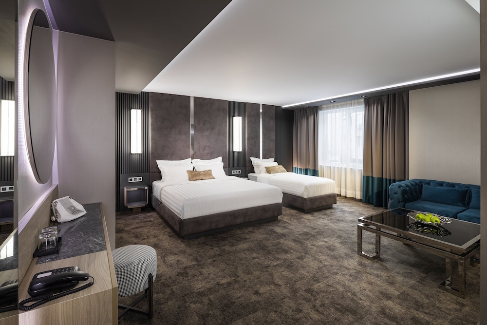 Deluxe Triple Room - Photo 1