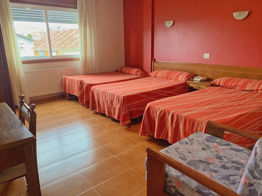 Habitación Triple, 3 Camas Individuales, Vista al Patio (con cama extra)