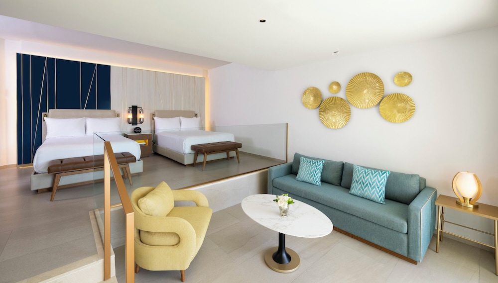 Deluxe Suite Double Beds & Sofa Bed