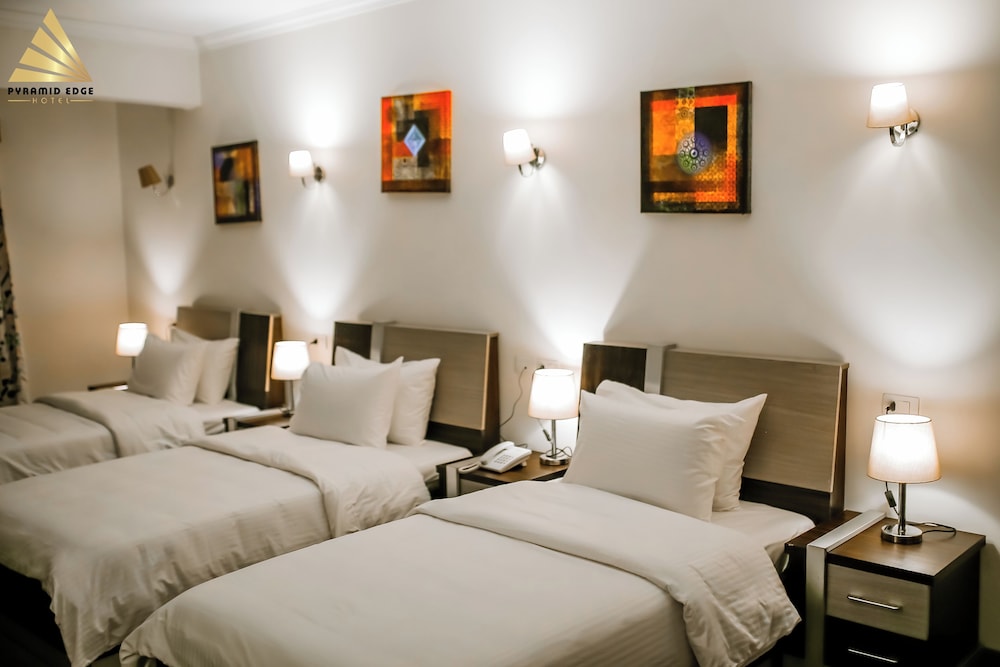 Standard Triple Room, City View - Photo 8