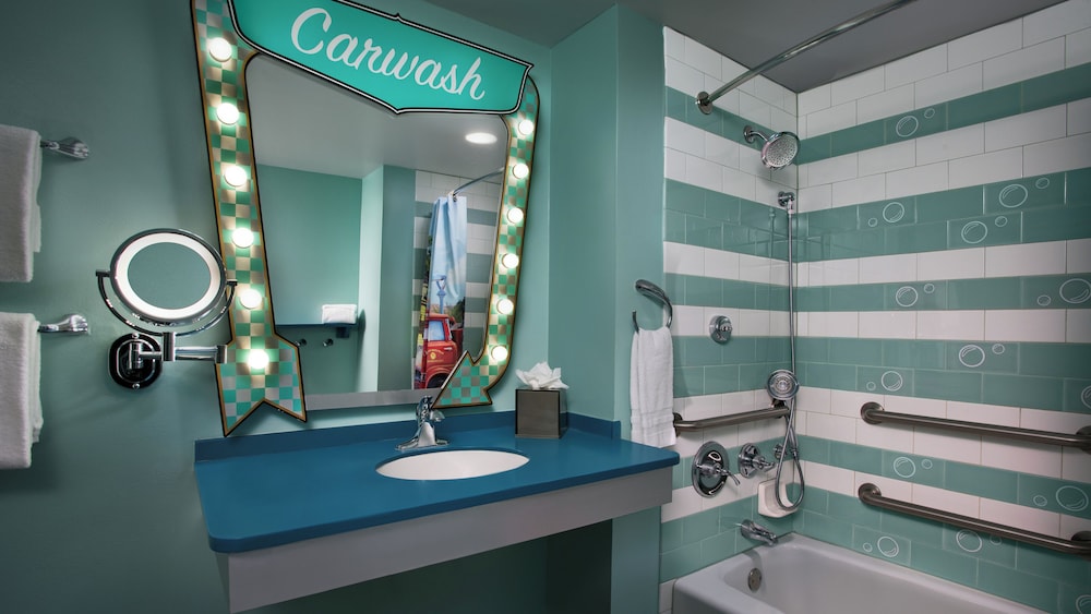 Cars Family Suites. Wheelchair accessible with tub and option for hearing accessibility.  1 queen be - Photo 3