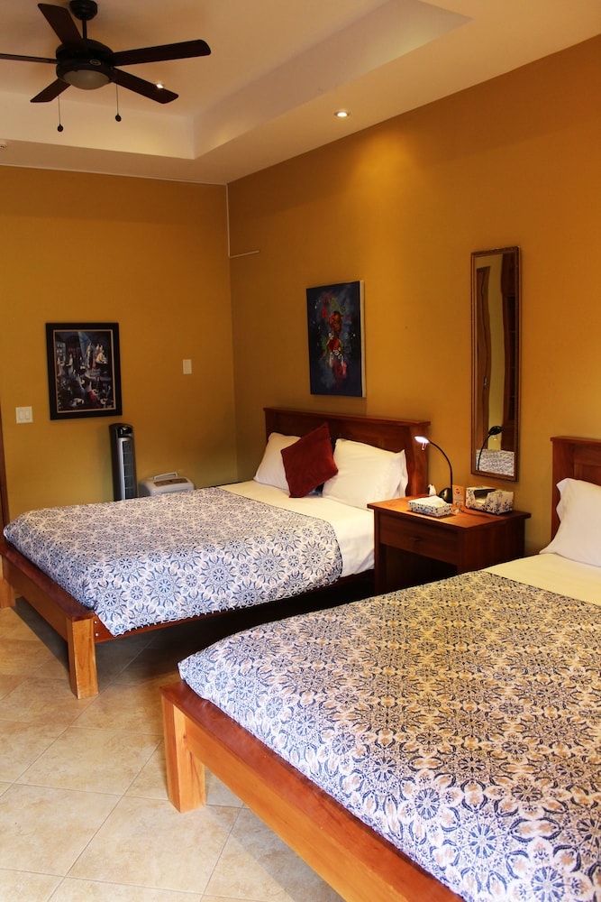 Family Double Room Single Use, 2 Queen Beds, Bathtub, Mountain View photo 1
