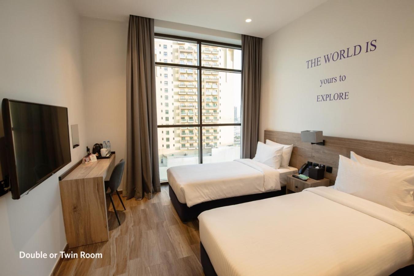 Deluxe Room Twin Bed with City View (includes 15% off F&B) photo 1