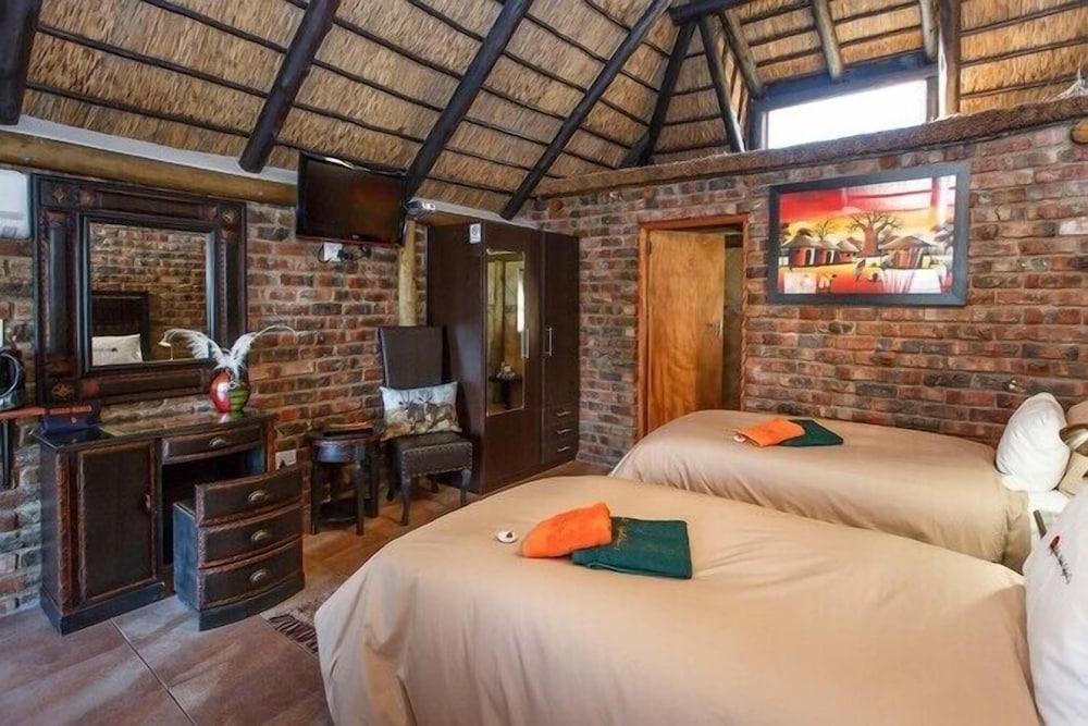Double Bed Thatched Chalets photo 2