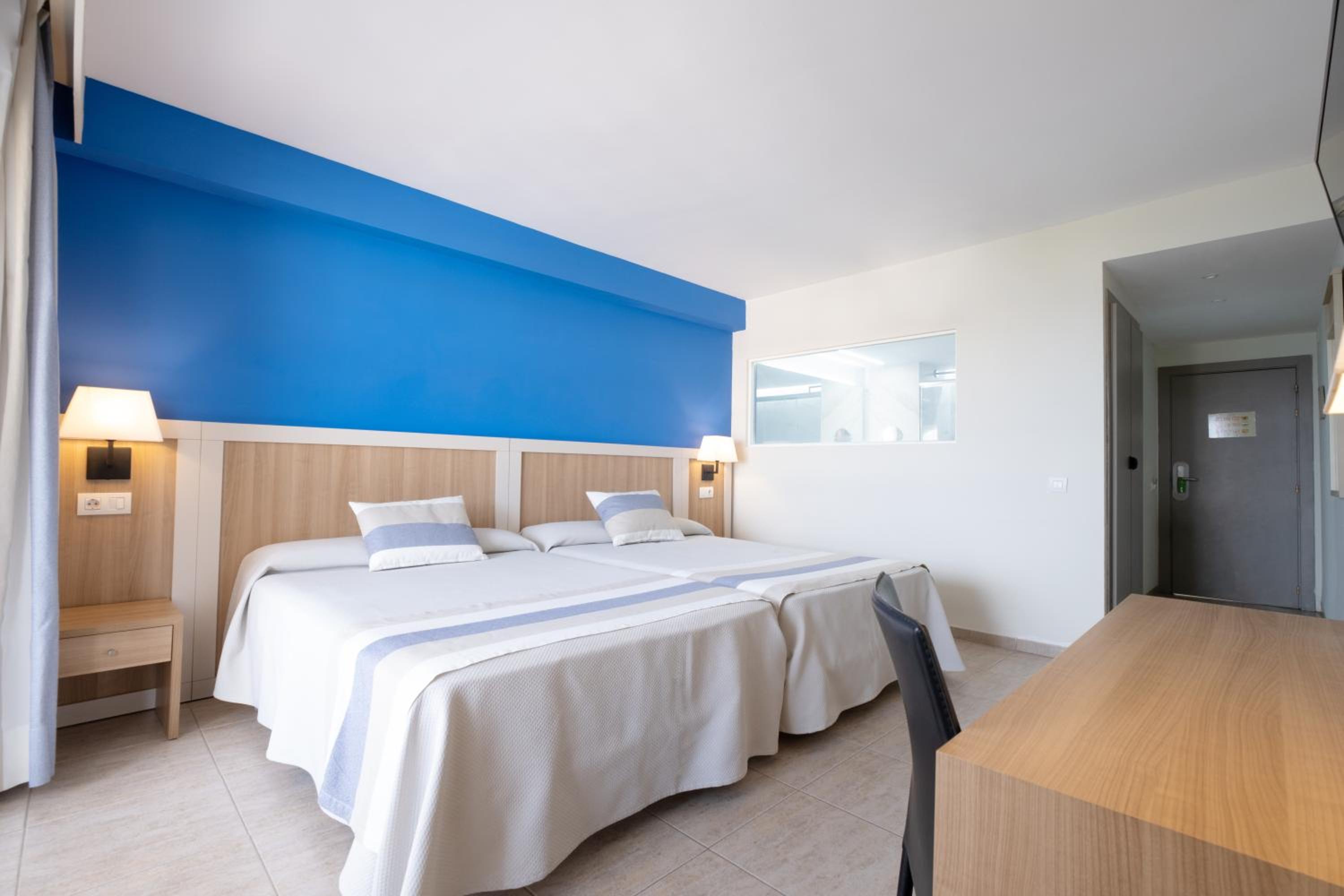 Twin Room with Sea View	(2 Adults + 1 Child)