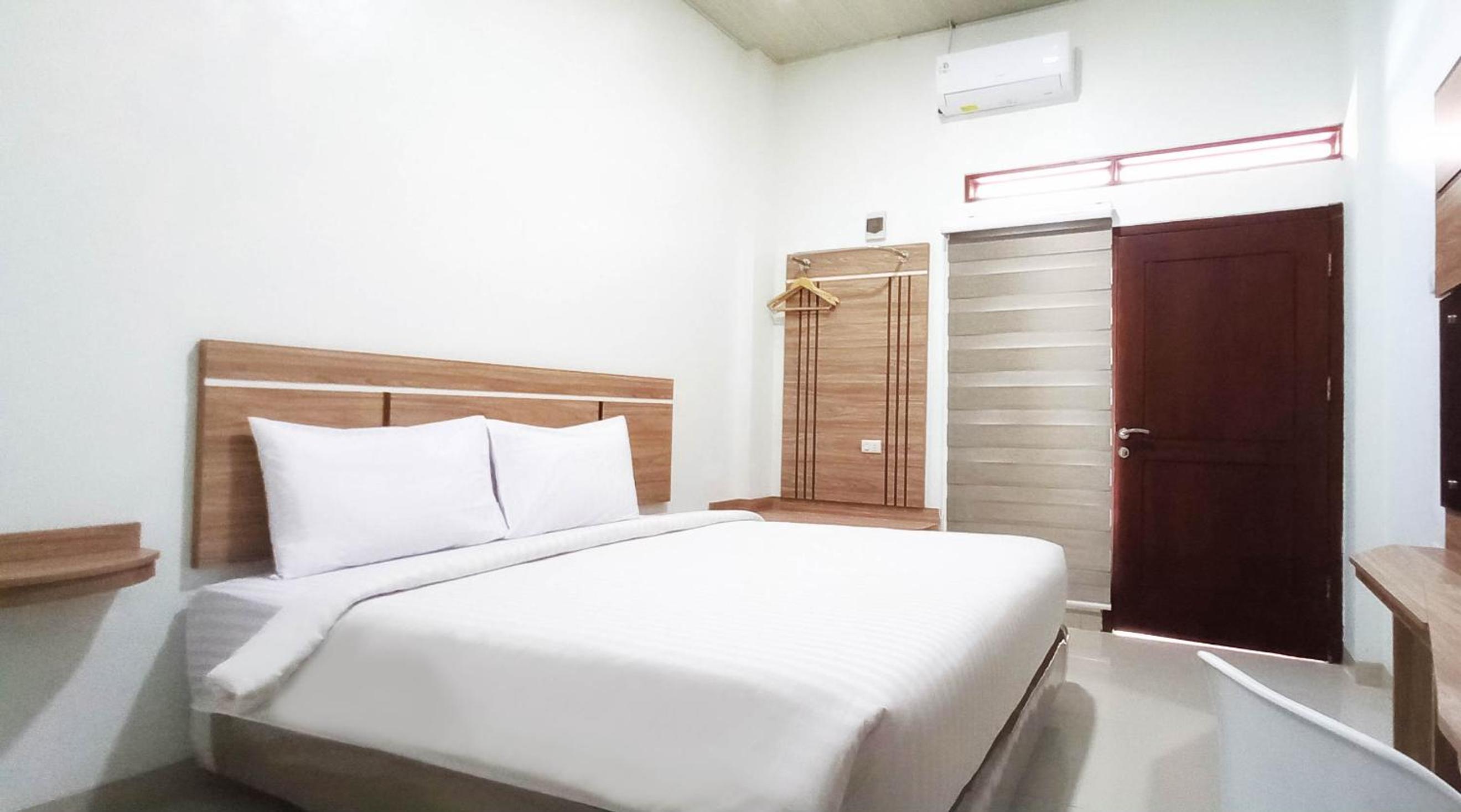 Deluxe Room - Photo 11