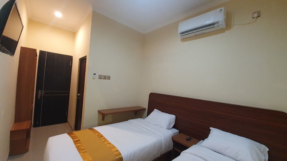 Standard Twin Room - Photo 3