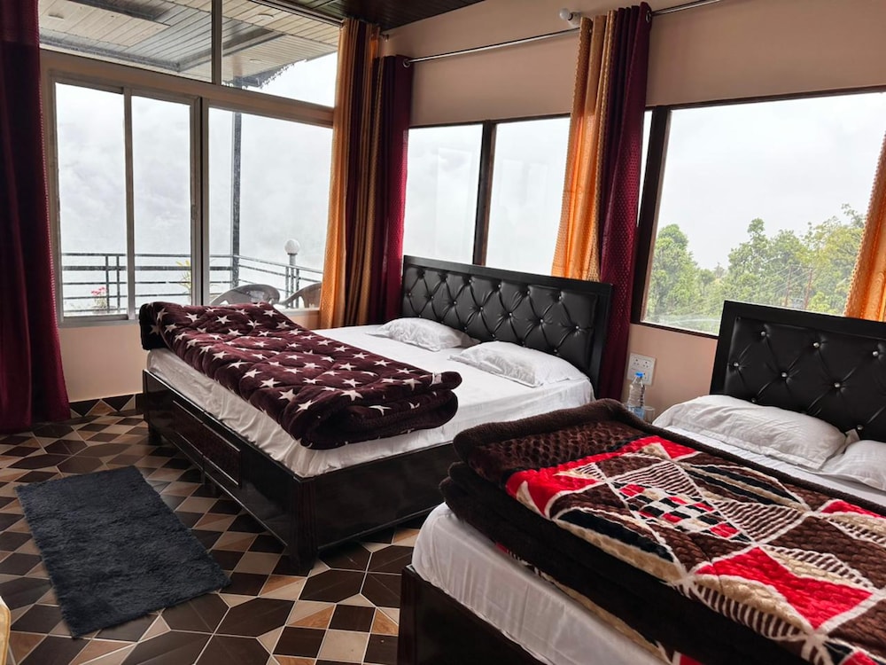 Deluxe Quadruple Room - Photo 1