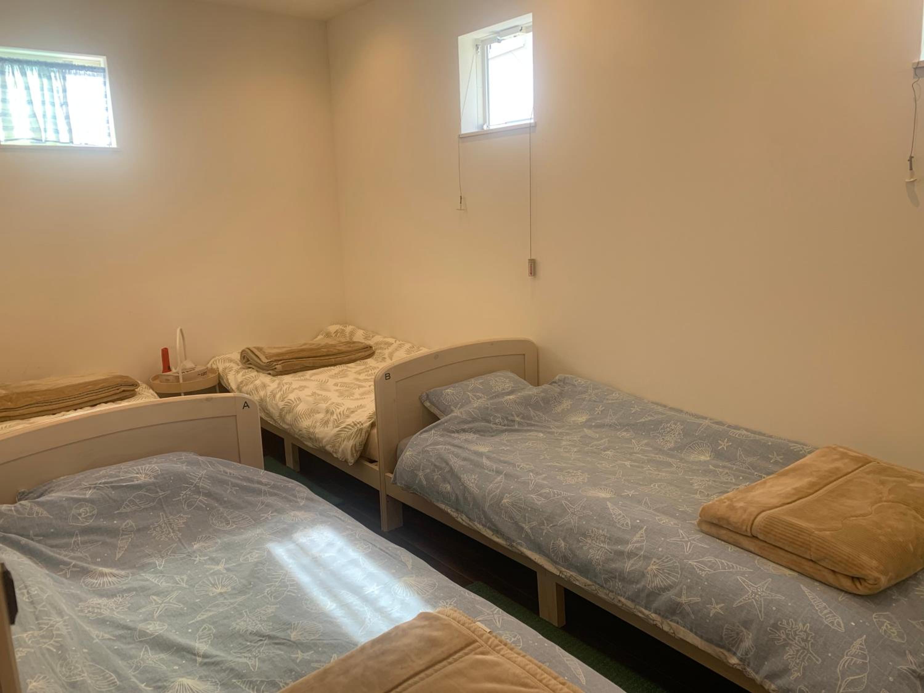 Quadruple Room with Shared Bathroom