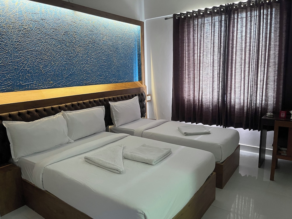 Deluxe Triple Room - Photo 5