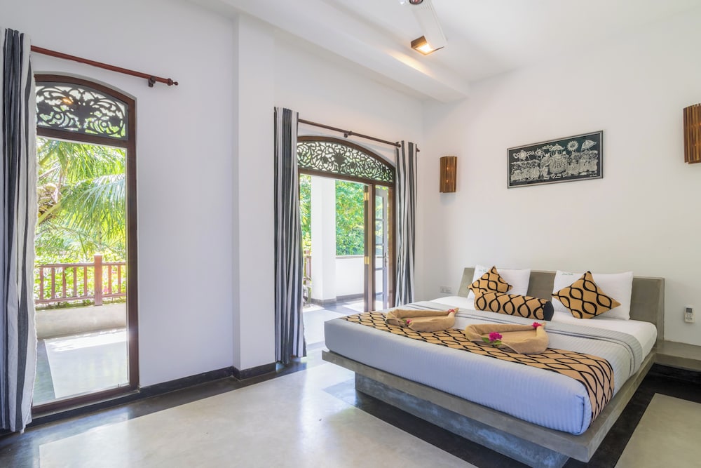 Deluxe Double Room, 1 King Bed, Balcony, Garden View photo 1